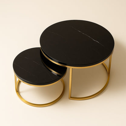 Tables basses gigognes rondes Eclipso dorées, marbre noir élégant et structure raffinée.