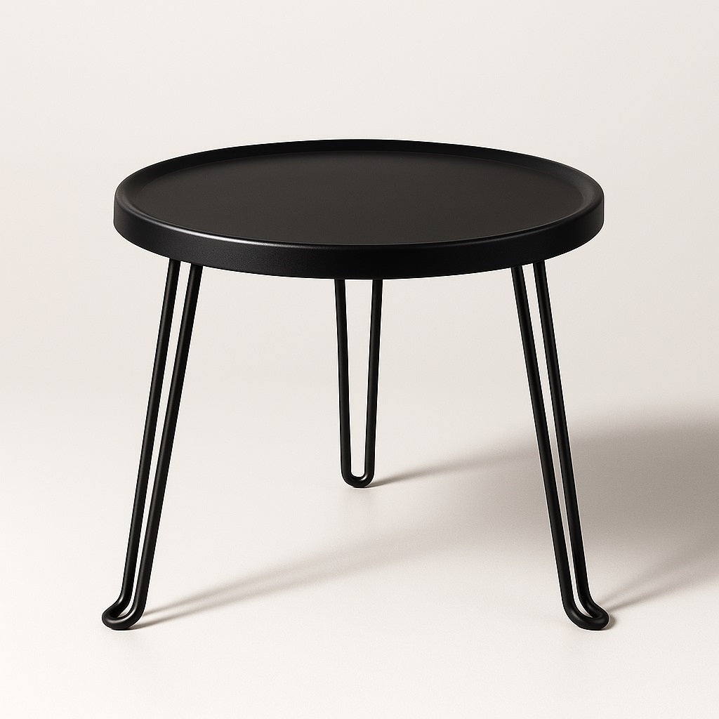 Table basse ronde noire Arcus avec pieds en métal, design moderne et minimaliste pour salon ou extérieur.