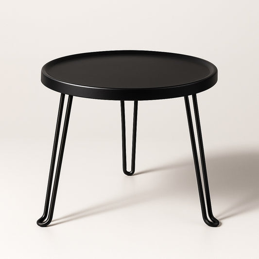 Table basse ronde noire Arcus avec pieds en métal, design moderne et minimaliste pour salon ou extérieur.