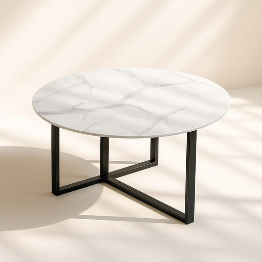 Table basse ronde en verre effet marbre blanc avec structure métal noir design moderne.