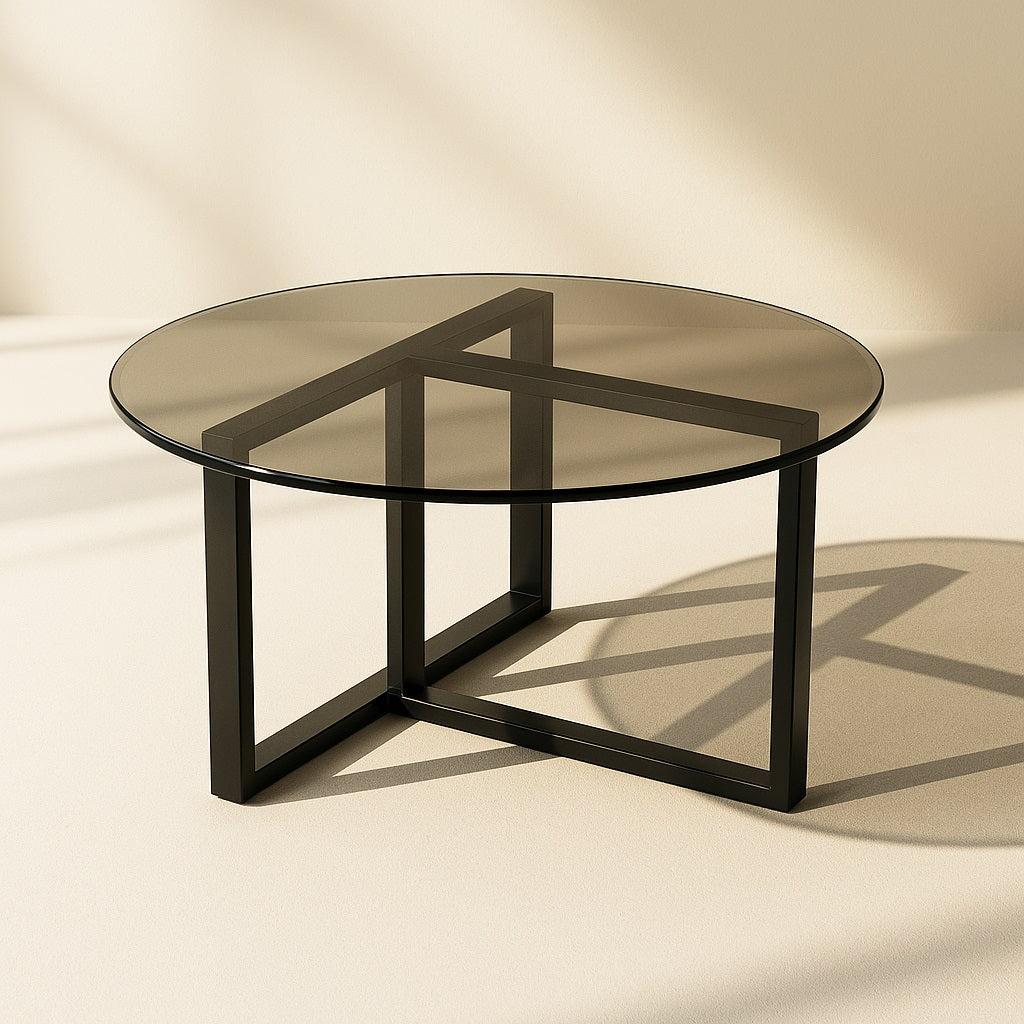 Table basse ronde en verre fumé avec structure métal noir design moderne et épuré.