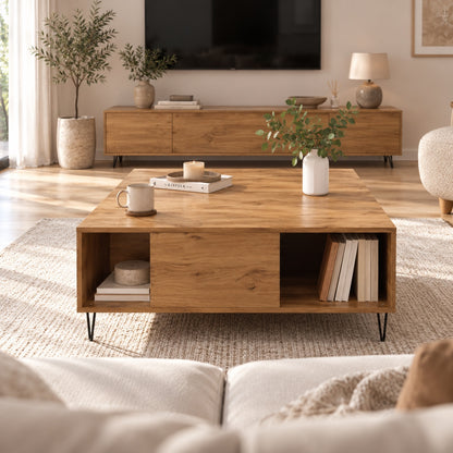 Table basse de salon en bois avec niches de rangement, vue de face dans un séjour moderne et lumineux.