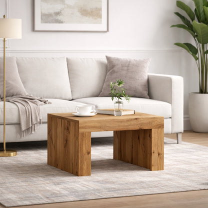 Table basse en bois clair installée dans un salon moderne, ambiance chaleureuse et design épuré.