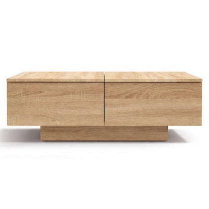 Table basse en bois clair vue de face, finition naturelle et lignes nettes pour un salon épuré.