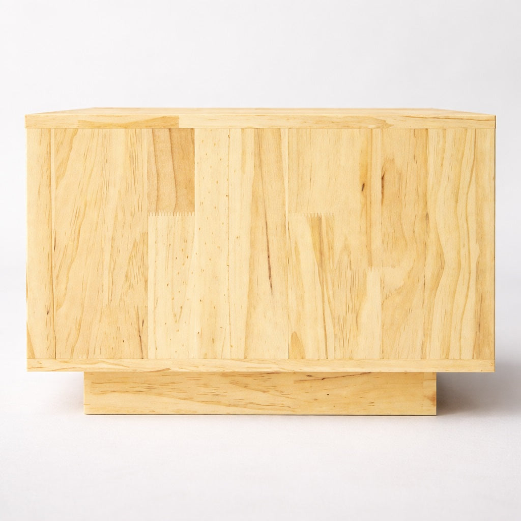 Table basse en bois Varka vue latérale, structure monobloc sobre pour une table basse de salon contemporaine.