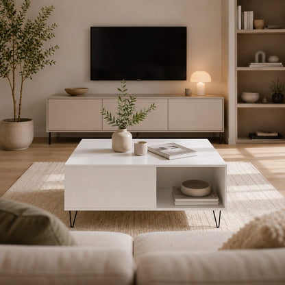 Table basse blanche avec rangement dans un salon contemporain, vue de face, décoration épurée et lumière naturelle douce.