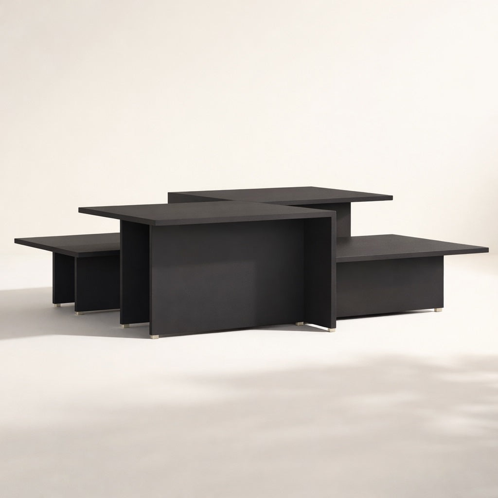 Table basse design noire modulable à plusieurs niveaux, style contemporain et graphique pour salon moderne.