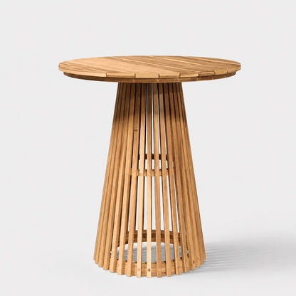 Table basse de jardin ronde en bois naturel avec design ajouré, idéale comme table basse d’extérieure moderne.