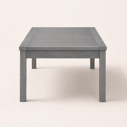 Vue de face d’une table basse d’extérieur rectangulaire grise design moderne pour terrasse