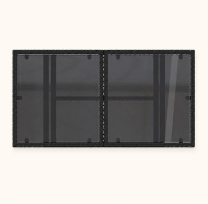 Table basse d'extérieur noire avec double plateau verre fumé vue du dessus sur fond clair