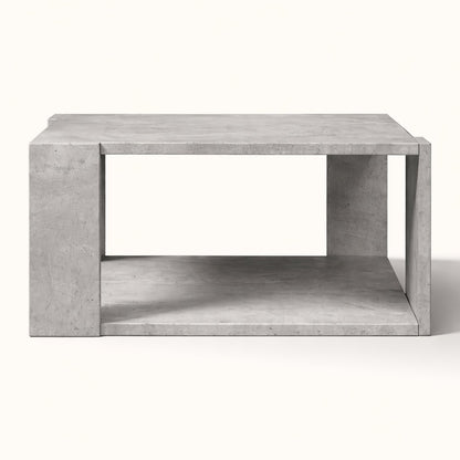 Table basse de salon grise vue frontale, style architectural moderne avec niche inférieure