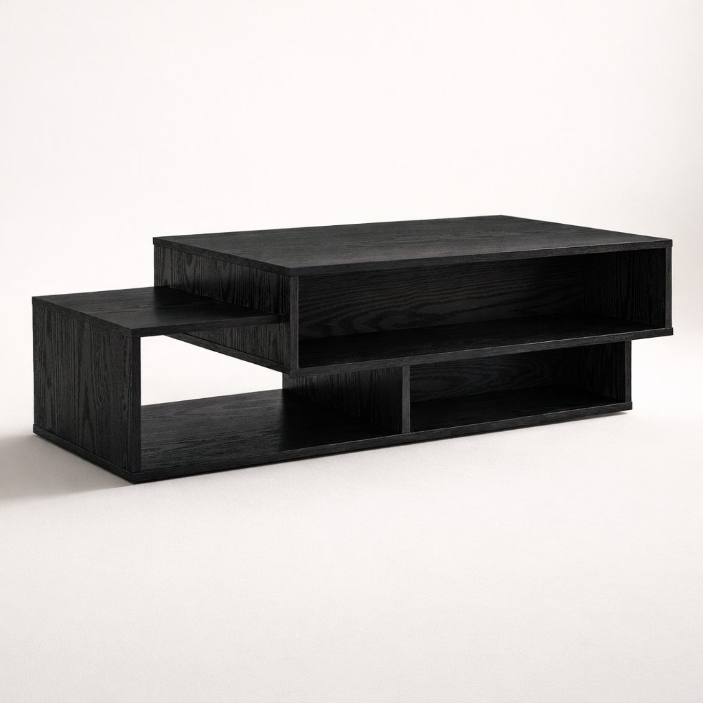 Table basse salon noire au design structuré et épuré, vue en angle, idéale pour un intérieur moderne et élégant.