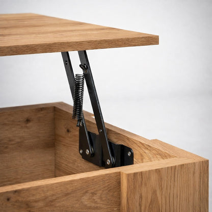 Mécanisme de relevage intégré d’une table basse en bois, pratique et robuste, pensé pour une table basse de salon fonctionnelle.