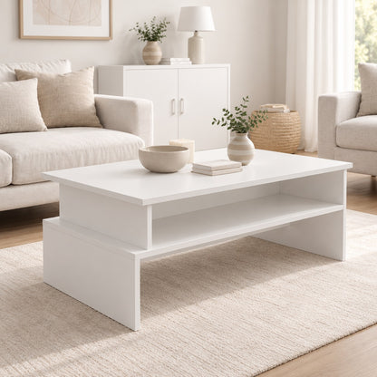 Table basse blanche avec rangement ouvert, au design moderne, mise en scène dans un salon lumineux et élégant.