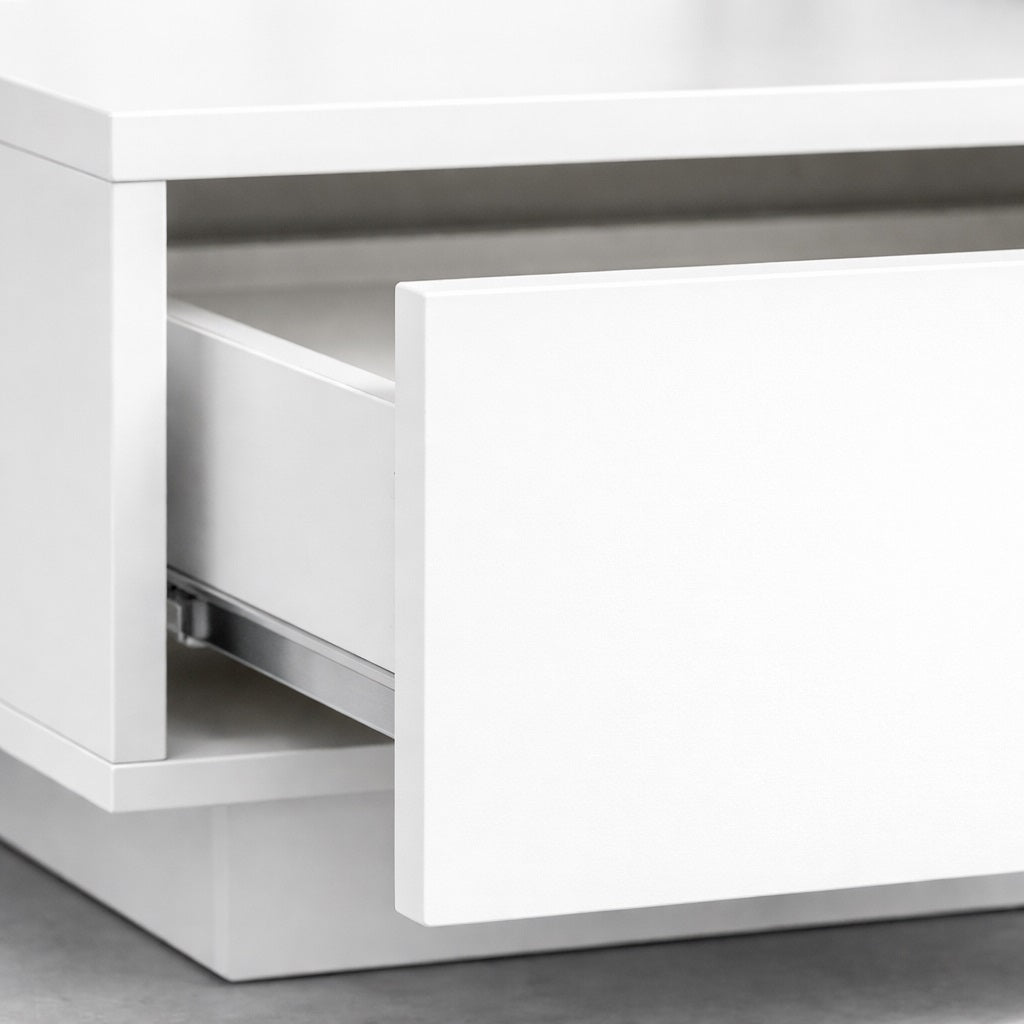 Détail tiroir table basse salon blanche, finition lisse et mécanisme de rangement intégré.