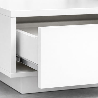 Détail tiroir table basse salon blanche, finition lisse et mécanisme de rangement intégré.