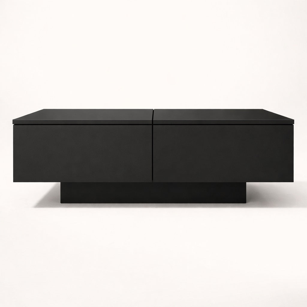 Table basse salon noire vue de face, style contemporain et volumes structurés.