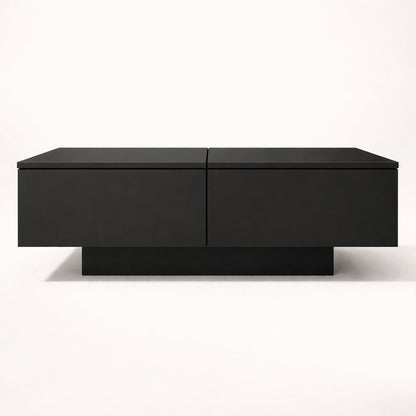 Table basse salon noire vue de face, style contemporain et volumes structurés.