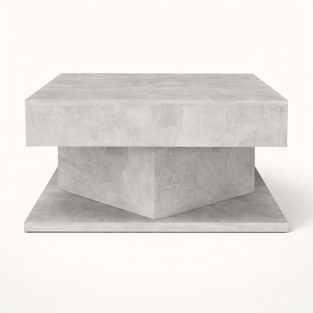 Table basse design grise aux lignes géométriques, parfaite pour une table basse de salon moderne.